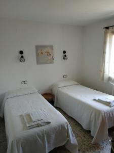 Posteľ alebo postele v izbe v ubytovaní Les oliveres de l'Empordà