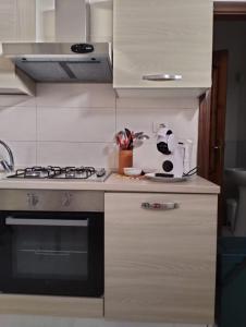 Kitchen o kitchenette sa Da Rox (Casa Vacanza) centro Porto Torres