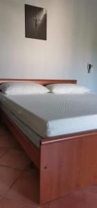Postel nebo postele na pokoji v ubytování Casa Mondorosso + 19 fotografií