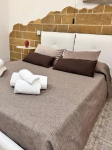 Postel nebo postele na pokoji v ubytování B&Beach Ospitalità Siciliana