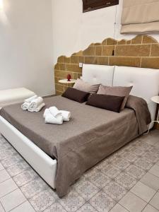 Postel nebo postele na pokoji v ubytování B&Beach Ospitalità Siciliana