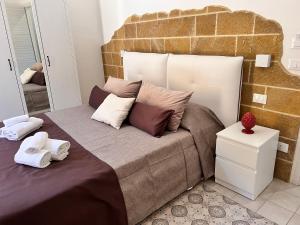 Postel nebo postele na pokoji v ubytování B&Beach Ospitalità Siciliana