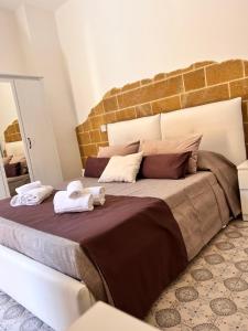 Postel nebo postele na pokoji v ubytování B&Beach Ospitalità Siciliana