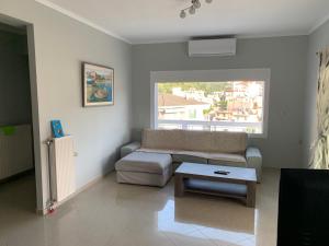 A seating area at Τhe Sunny Apartments