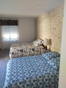Katil atau katil-katil dalam bilik di La petite ferme 37