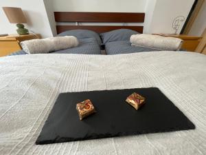 Posteľ alebo postele v izbe v ubytovaní Wash House Apartman