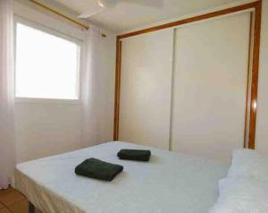 Postel nebo postele na pokoji v ubytování Vibrant central Albir pad + 3 fotografie