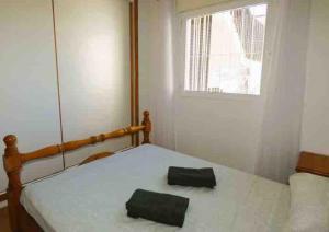 Postel nebo postele na pokoji v ubytování Vibrant central Albir pad