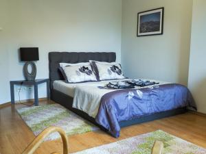 Łóżko lub łóżka w pokoju w obiekcie Apartamenty Świętego Wita