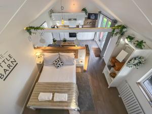 an overhead view of a bedroom in a tiny house at The Little Barn in Hoxne