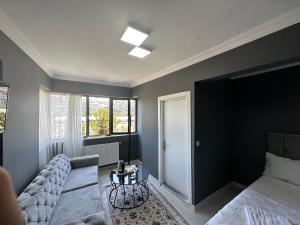 Postel nebo postele na pokoji v ubytování Arena Resort Otel Kagıthane