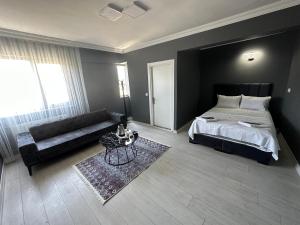 Postel nebo postele na pokoji v ubytování Arena Resort Otel Kagıthane
