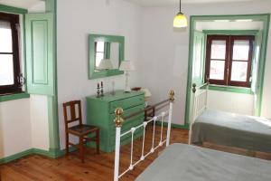 Een bed of bedden in een kamer bij Casa de Tagarro
