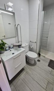 Ванная комната в Torres Del Sol Luxury Las Americas