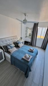Кровать или кровати в номере Torres Del Sol Luxury Las Americas