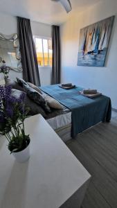 Postel nebo postele na pokoji v ubytování Torres Del Sol Luxury Las Americas