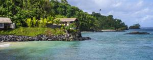 a resort on an island in the water at Seabreeze Resort Samoa – Exclusively for Adults in Aufaga