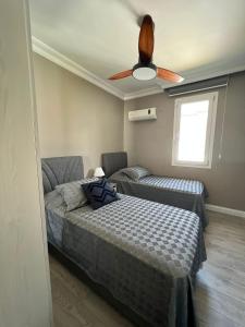 Postel nebo postele na pokoji v ubytování Seaside Calis