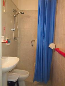 Koupelna v ubytování Hotel Aurora