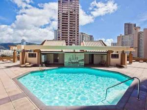 a large swimming pool on top of a building at Waikiki Panoramic Ocean View in Honolulu