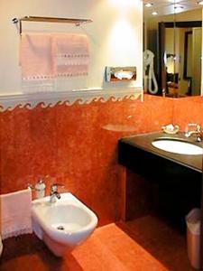 a bathroom with a sink and a toilet at Locanda A Cà Du Gigante in Monterosso al Mare