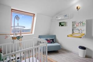 Postel nebo postele na pokoji v ubytování Duplex standing et confort - Baby ready - 2 minutes de la plage Anse Mitan