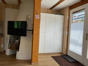TV a/nebo společenská místnost v ubytování Tiny Haus Dornbirn