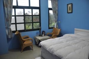 Letto o letti in una camera di Wushih Surf Hostel