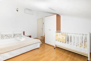 Posteľ alebo postele v izbe v ubytovaní Villa Jakov