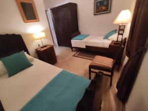 Posteľ alebo postele v izbe v ubytovaní Villa Belvedere