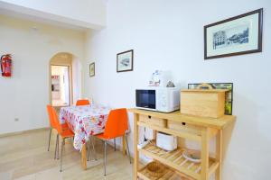 A kitchen or kitchenette at Kaminaki Beachfront Apartments