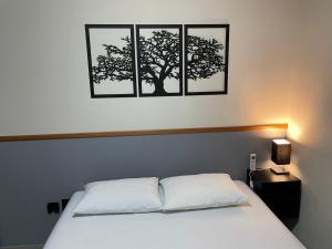 Cantinho Estrelado - Casa automatizada com ALEXA客房内的一张或多张床位