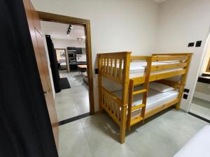 Cantinho Estrelado - Casa automatizada com ALEXA客房内的一张或多张床位