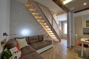 Posezení v ubytování Vicolo Mincio Home