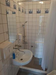 Kúpeľňa v ubytovaní Dom wypoczynkowy Led