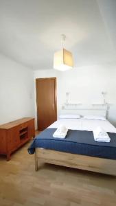 Uma cama ou camas num quarto em Tulip