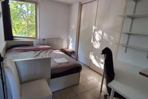 Krevet ili kreveti u jedinici u objektu Montpellier: appart cozy et spacieux au centre