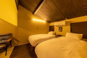 Кровать или кровати в номере Tsuki-Akari Takayama - Japanese modern Vacation Stay with an open-air bath