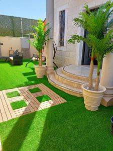 Taman di luar Al bader villa