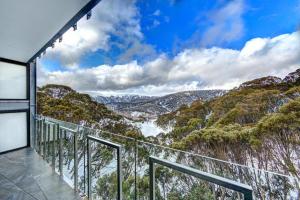 a balcony with a view of the mountains at Snow Ski Apartments 19 in Falls Creek