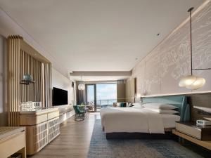 TV a/nebo společenská místnost v ubytování Qinhuangdao Marriott Resort