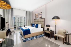 Postel nebo postele na pokoji v ubytování Stunning studio near Burj Khalifa