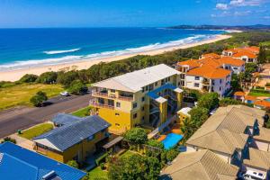 an aerial view of a house and the beach at Pippi Beach Penthouse in Yamba
