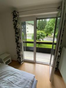 Postel nebo postele na pokoji v ubytování NOCK - Zentrum Studio + 8 fotografií