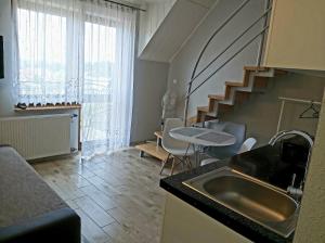 Kuchyň nebo kuchyňský kout v ubytování Mila + 14 fotografií