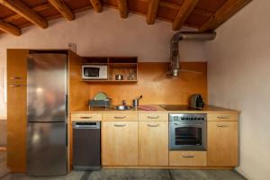 Virtuvė arba virtuvėlė apgyvendinimo įstaigoje La casa azul