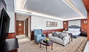 Posezení v ubytování Guangming CIMC Executive Hotel Shenzhen + 31 fotografií