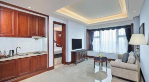 TV o dispositivi per l'intrattenimento presso Guangming CIMC Executive Hotel Shenzhen