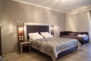 Postel nebo postele na pokoji v ubytování Hotel Souita + 27 fotografií