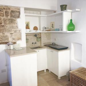 Kuchyňa alebo kuchynka v ubytovaní Casa con Vista a POLIGNANO a Mare